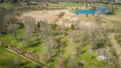 Aerial photo shows the creek and walkway to the re
