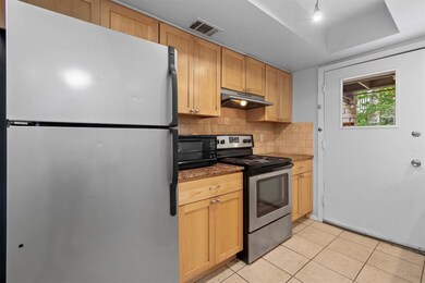 Kitchen with stainless steel appliances, under ca