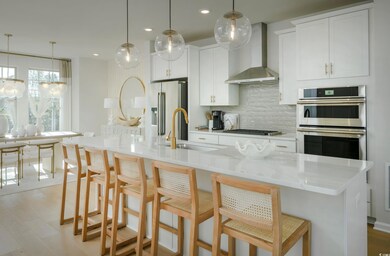 Kitchen featuring stainless steel appliances, sink