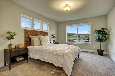 Private, master suite to escape to after a busy day.  Enormous walk-in closet stores everything and then some.