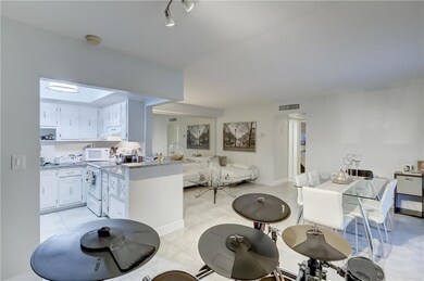 Spacious living area.  Drum set in dining area wit