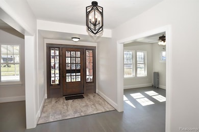 Foyer Featuring Stunning Vintage Door