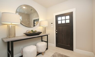 Another look at the entryway and mahogany wood fro