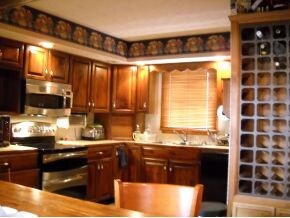 KITCHEN W BUILT IN WINE SHELF
