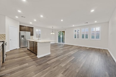 Kitchen with appliances with stainless steel finis
