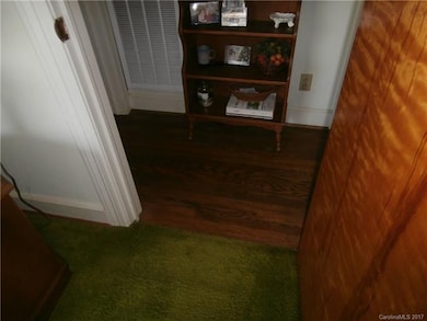 A view of the hardwood flooring in the hall.