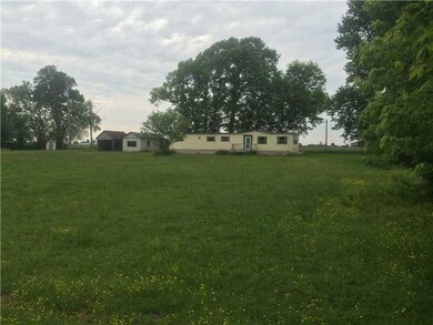 Land. Beautiful 1 Acre - The mobile needs work.