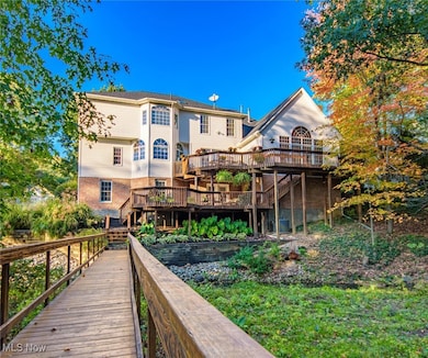 Back of the house view of 2-tiered​​‌​​​​‌​​‌‌​​​‌​​‌‌​​‌‌​‌​​​‌‌​​‌​​​​​‌ deck