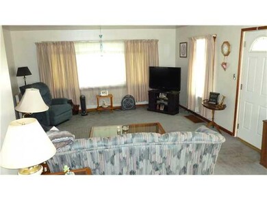 Living Room Large picture window lets in the sunli