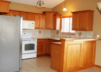 Kitchen is compact but has plenty of counter works