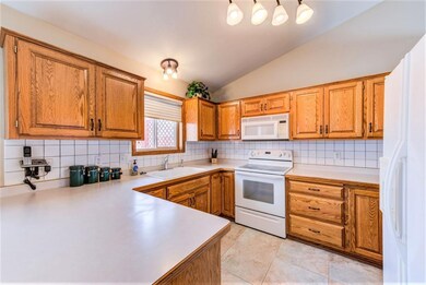 STEP SAVER KITCHEN OFFERS NATURAL LIGHT, TILED FLO