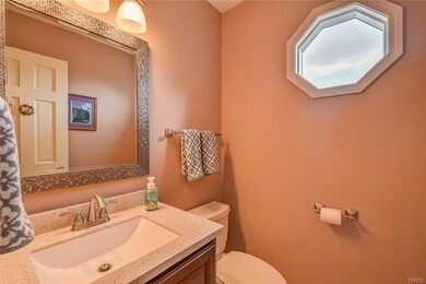 Unique Octagon window in first floor half bath to 