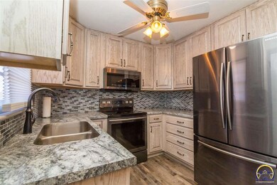 144 SW 40th Terrace, Topeka, KS 66609 - photo 4