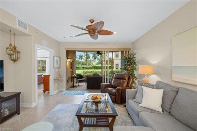 Tiled living room with ceiling fan