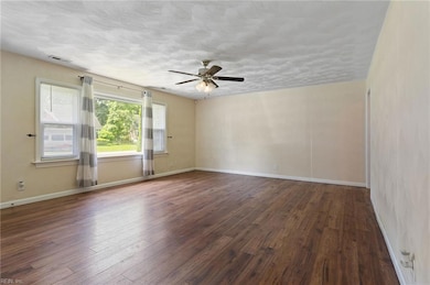 Spacious living room offers lots of natural light