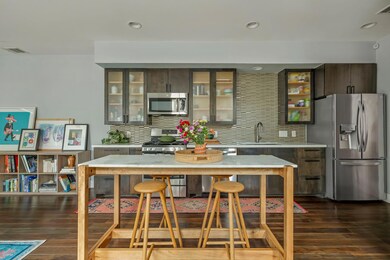 Kitchen featuring appliances with stainless steel