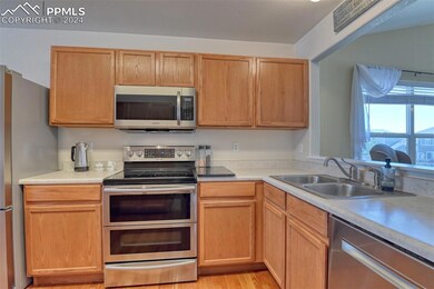 Kitchen featuring sink, stainless steel appliances