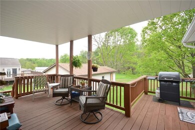 Cozy Rear Deck overlooking Level Yard.