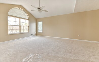 Living room open to dining area.