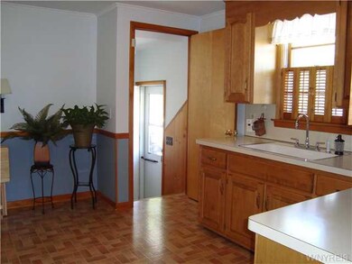 Kitchen. Enter from the side door into a hallway. 