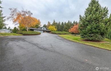 Enter through the gate and feast your eyes on a beautiful property!