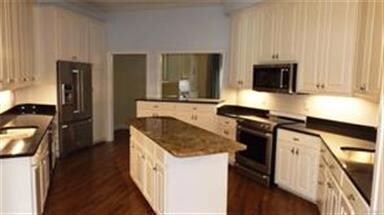 Kitchen With Large Work Island, Two Sink Areas, Lo