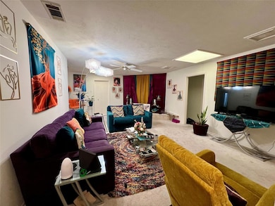 View of the eclectic living room from the wetbar.