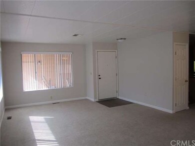 Open living room with lots of incoming light and n