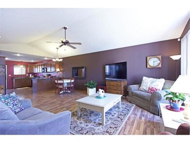 An inviting open floor plan awaits you as you ente