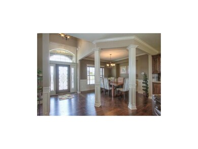 Simulated Photo. Formal Dining Room & Entry w/ han