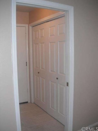 Laundry room + pantry room off kitchen.  Door lead