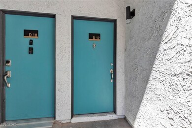 Property entrance featuring stucco siding