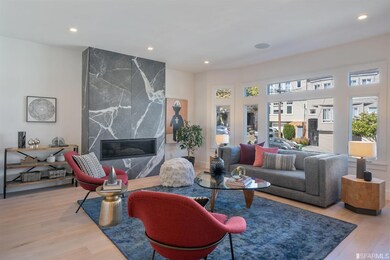 A huge marble-wrapped island matches the counterto