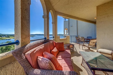 Large private outdoor seating area - some covered and some uncovered - with views of Lake Travis
