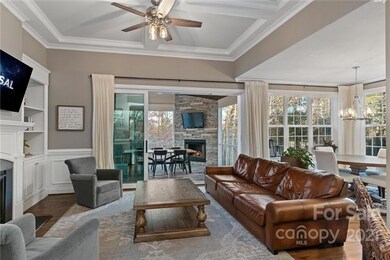 The multi-panel sliding glass doors open from the 