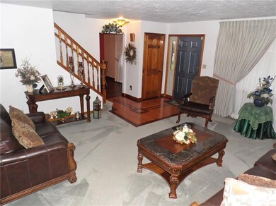 Entrance has  beautiful inlaid custom hardwoods an