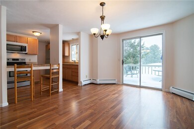 FORMAL DINING TO KITCHEN TO DECK
