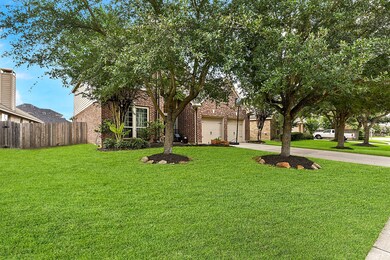 Another view showcases the spacious front yard space this home offers.