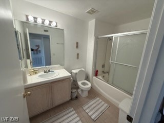 Full bath with enclosed tub / shower combo and vanity