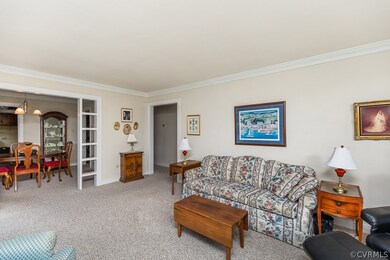 View from living room towards dining room and hallway.