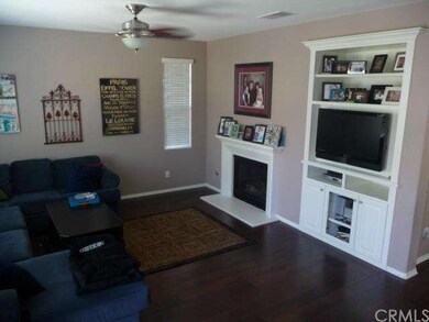 Family room with fireplace and built in custom ent