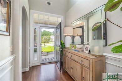Nice two story foyer area with hardwood floors.