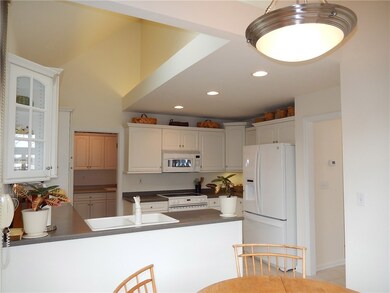 Kitchen has vault ceiling