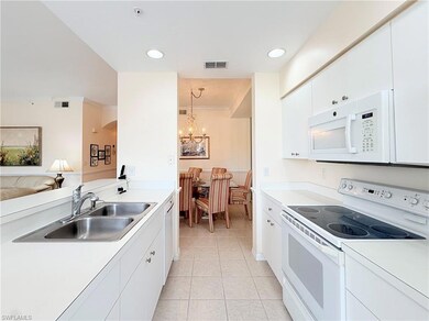 Kitchen open to dining and living room