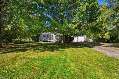 View of yard with a garage