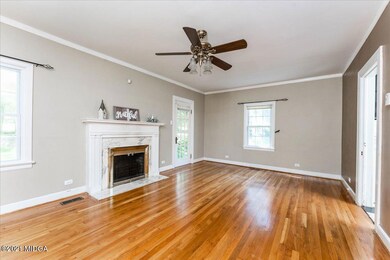 Great Room with Fireplace and Patio Door
