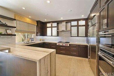 Fully appointed kitchen features stainless Wolf ga