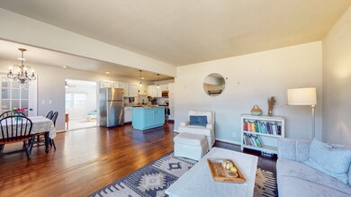 This is the view upon entering the home- a very welcoming living room/dining area combination.