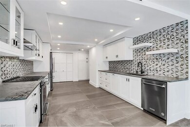 Kitchen featuring sink, appliances with stainless 
