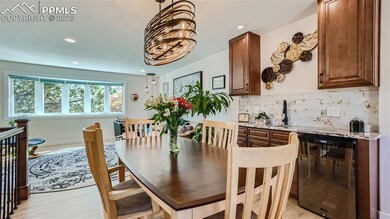Dining area. Gorgeous high end lighting.